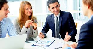 Employee working at desk in Tekstrafin office